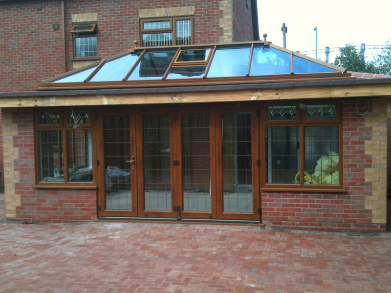 Modern Sunroom or conservatory extending into the garden | Mainstream Windows